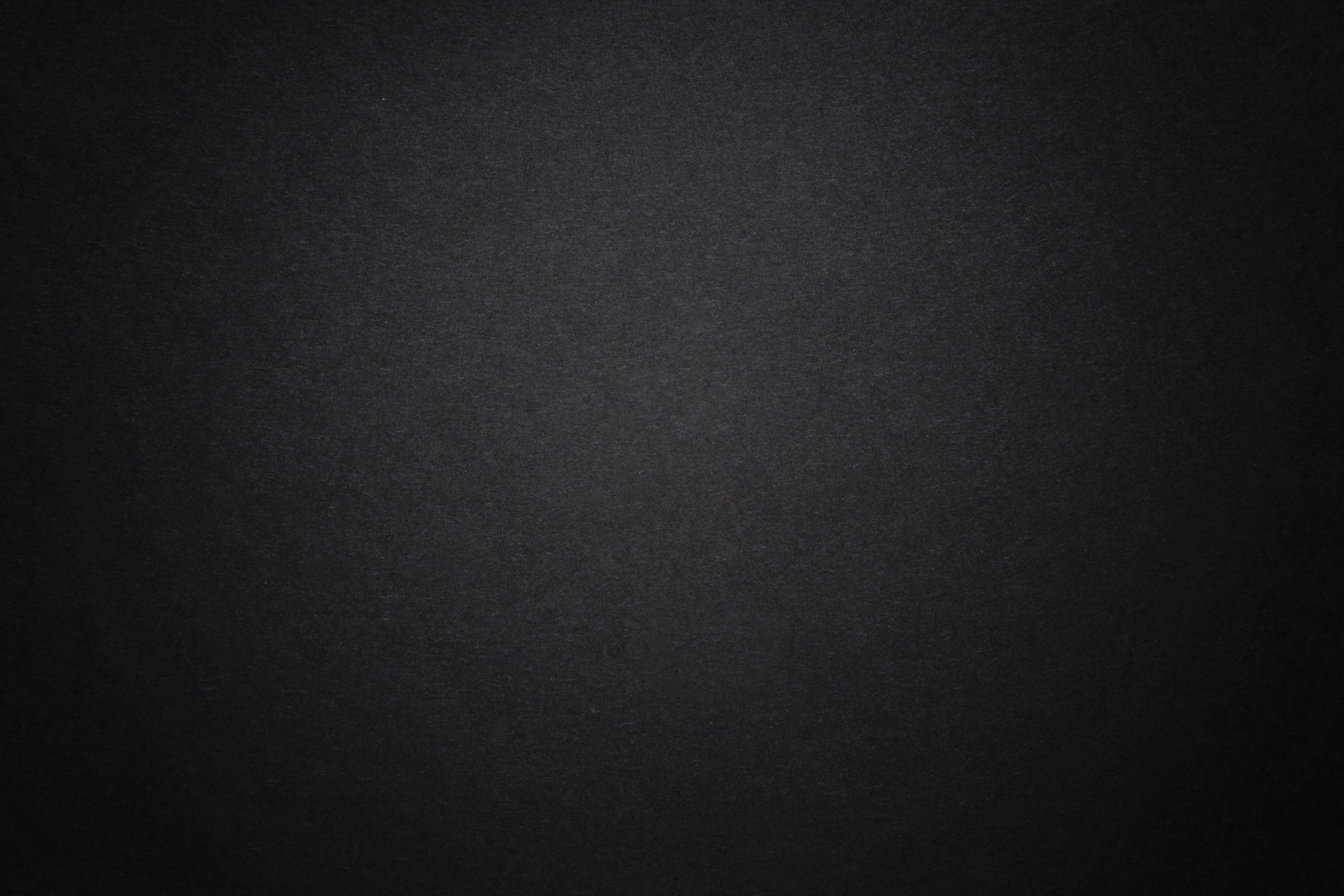 Black Dark Background with Light Copyspace in Middle
